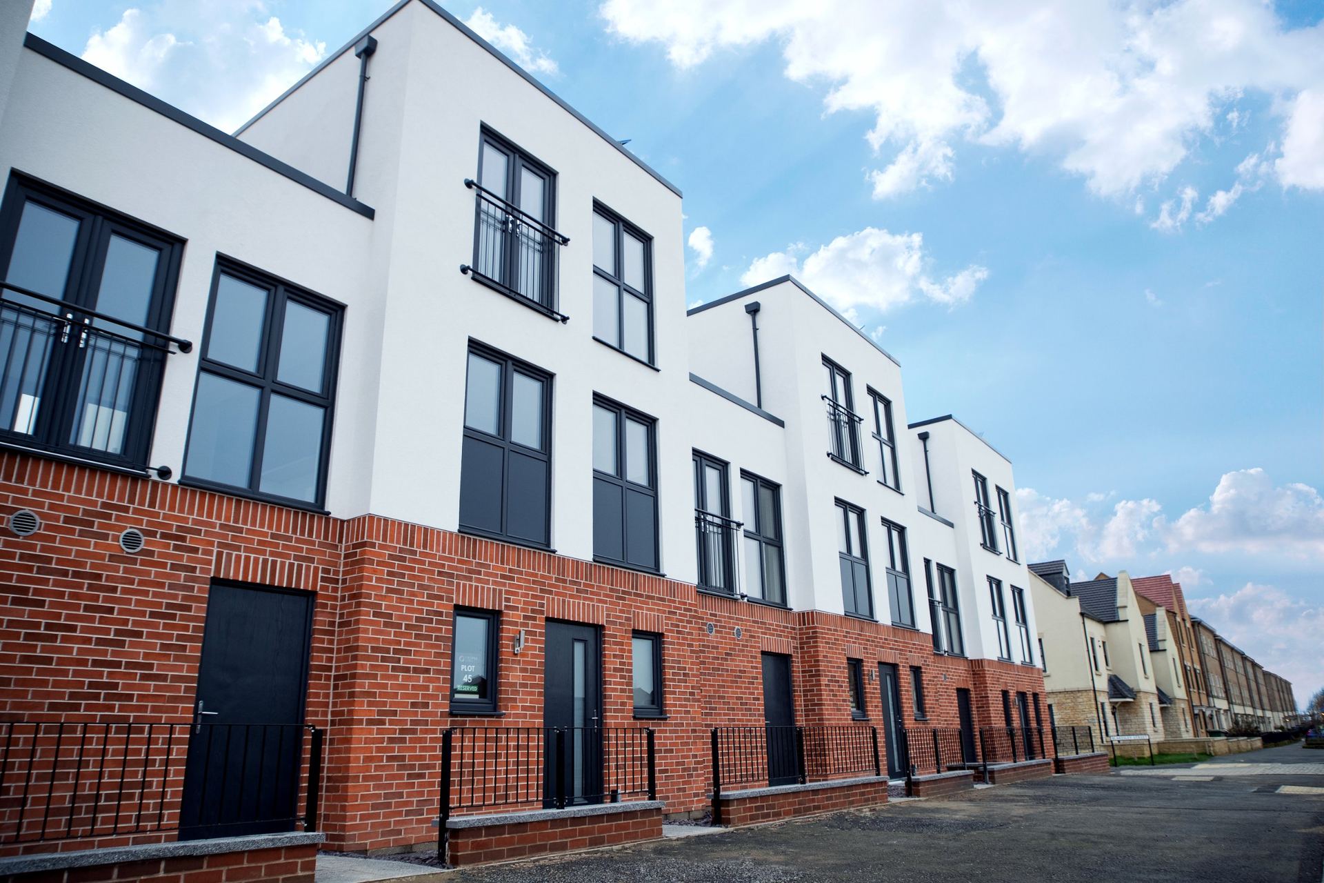 Three-storey homes in Corby, Northamptonshire, built with structural shells from timber frame and SIP manufacturer Etopia Custom